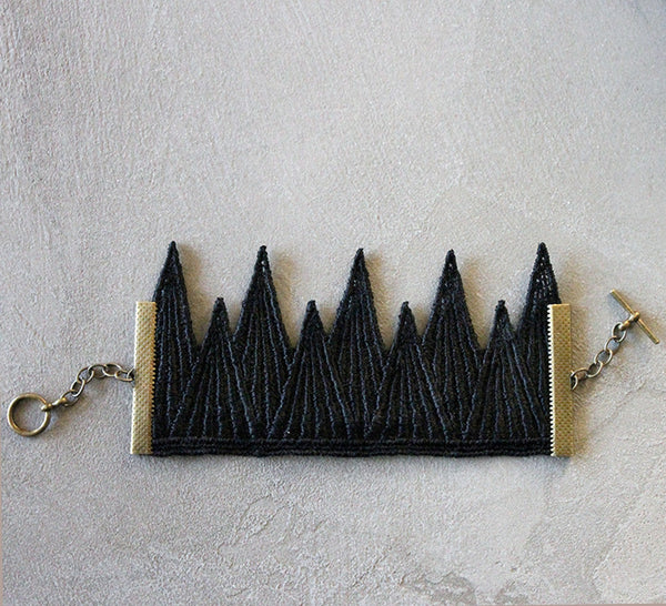 tiny mountains black lace cuff