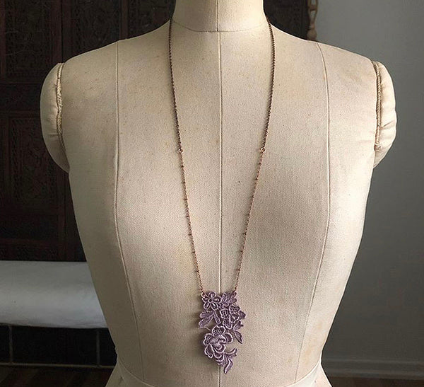 rosette long necklace